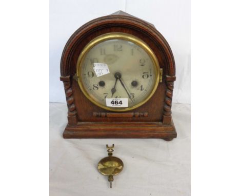 A vintage oak cased mantel clock with eight day gong striking movement a/f