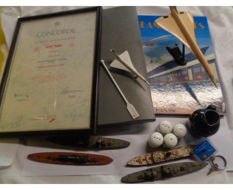 A crate containing a quantity of Concorde memorabilia including flight certificates, Dream Voyages book, models, etc. - sold 