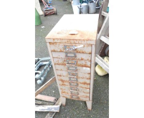 A vintage metal ten drawer narrow filing chest
