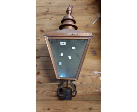 A vintage glazed garden light of streetlamp form with copper frame a wrought iron fitting