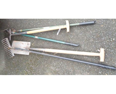 A small quantity of long handled garden tools