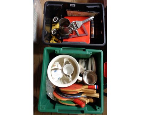 A crate containing a quantity of collectable items including Tonka Loader toy, Morris 1100 exhaust tail pipe, a tin containin
