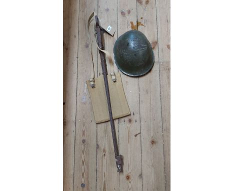 A WWII period canvas map pouch and tin helmet - sold with a recovered part bolt-action rifle