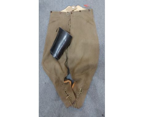 A pair of whip cord trousers - sold with a pair of black leather gators