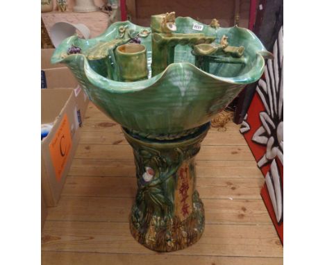 A 20th Century Chinese pottery water feature, the large bowl with a bamboo water flight and frog and grape vine decoration, t