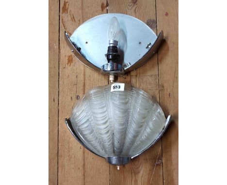 An Art Deco wall light with chrome plated frame and moulded glass shell form shade - sold with another chrome plated frame