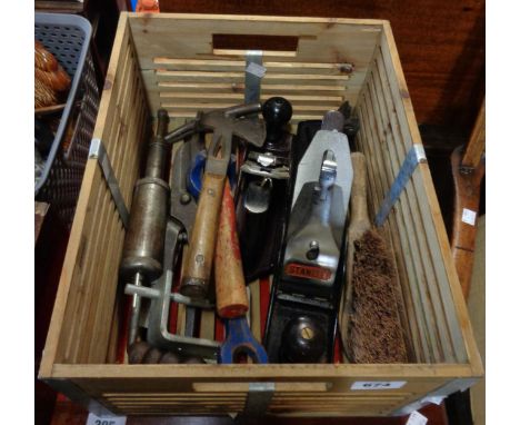 A wooden crate containing a quantity of carpentry tools including Stanley No 5 1/2 plane, Rabone set square, etc.