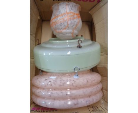 A box containing two vintage Art Deco glass ceiling lamp shades with chains and a similar glass lampshade