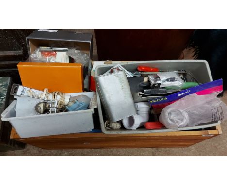 A wooden box containing a quantity of assorted tools, fittings, etc.
