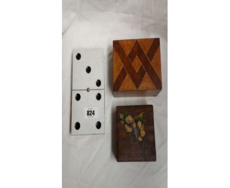An Italian pokerwork and painted box containing a quantity of dice and another box - sold with a vintage Codeg plastic domino