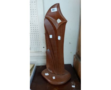 A vintage carved wood abstract sculpture