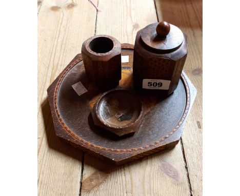 A vintage French wooden smoker's companion set with carved and pokerwork decoration
