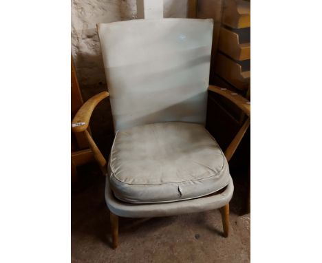 A light Ercol part show frame elbow chair with white vinyl upholstery and seat cushion - wear