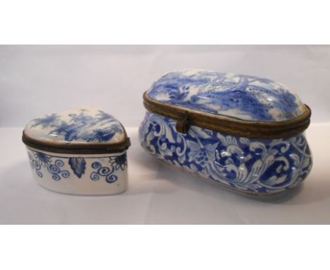 An antique tin glazed pottery snuff box with gilt metal fittings, the lid decorated with a girl on a swing, the body with fol