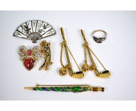 A collection of various gilt metal, enamel and paste set brooches etc, including apples, golfers and golf clubs, etc, in Ciro