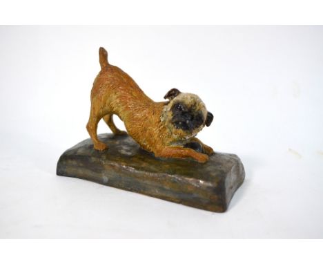 Stella R Crofts - 'Podge' a glazed terracotta figure of a border terrier, guarding his ball, incised signature, title and dat