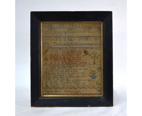 A 19th century needlework sampler, worked with alphabet and spiritual and improving texts, by Emma Wardle Thompson, aged 9 ye