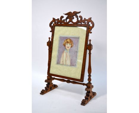 A satinwood-crossband easel photograph frame on turned wood stand with fret-cut decoration, c/w a watercolour miniature of a 