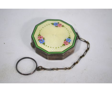 An American Sterling octagonal powder/rouge compact with floral and basse-taille enamel cover enclosing gilt interior fitted 