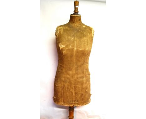 A 'Levine' London/Paris calico-covered haberdasher's mannequin on triform base  Condition Report Discoloured and 20 cm split 