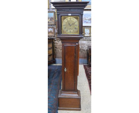 A George II oak and mahogany crossbanded longcase clock, 30-hour movement with 11in square brass dial by James Bradford, Buck