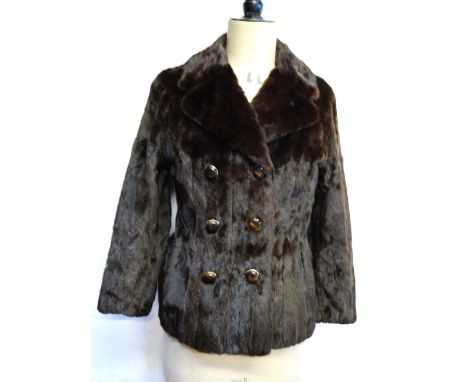 A dark brown squirrel fur double-breasted jacket with brown and gilt buttons, 51 cm across chest   Condition Report  Has been