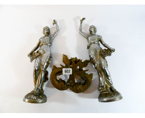 A pair of chrome plated spelter figures depicting ladies carrying flowers together with a large heavy brass door knocker in t