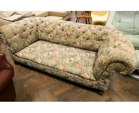 A two seater drop end Chesterfield settee in buttoned tapestry covering 