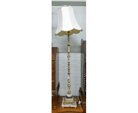 An onyx and brass standard lamp complete with shade 