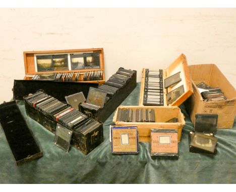 A large quantity of coloured glass magic lantern slides 