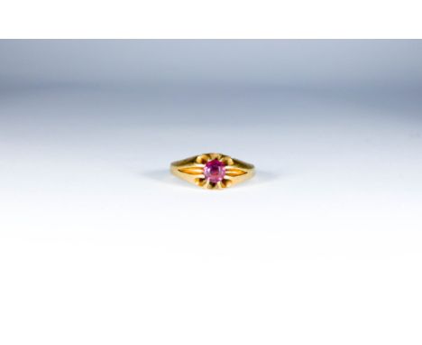 An 18ct gold ring set with a ruby in an eight claw setting, size N 1/2, weight  approximately 4.8g 