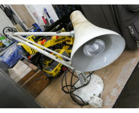 An angle poise lamp 