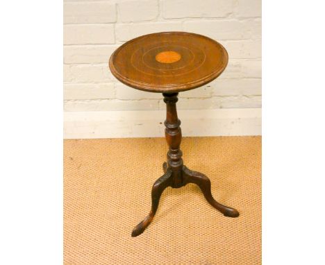 An inlaid mahogany wine table on tripod base 