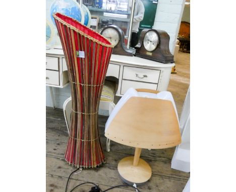 A retro style light oak and white plastic finished table lamp and a tall wicker basket shaped lamp 