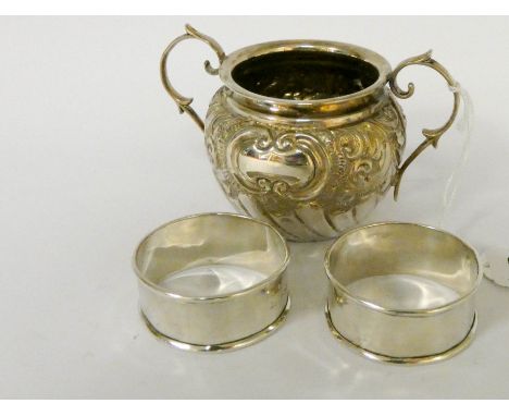 Silver twin handled sugar basin, Birmingham 1935 and a pair of silver napkin rings, gross weight , 3 troy ounces 