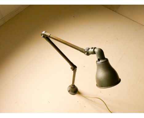 A wall fixing angle poised lamp 