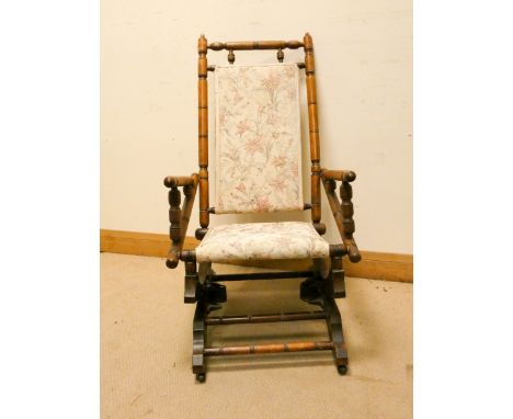 American walnut framed rocking elbow chair with tapestry seat and back 