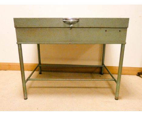 Industrial metal framed locking tool cabinet which would make a really cool desk 