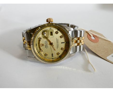 A gent's replica Rolex Oyster Quartz day/date Superlative Chronometer with cut bezel gem stones 