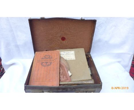 A leather craftsman's accessories and tools including two rolls of unused leather etc. and two vols. 'Artistic Leather Craft'