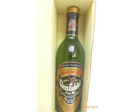 Bottle of Glenfiddich Scotch Malt Whisky in original box