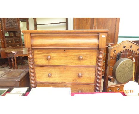 Mahogany Victorian chest of long scrolled upper drawer and three graduated lower drawers the latter with bobbin handles, with