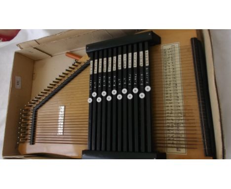A vintage Auto Harp, 32 strings and 12 chords, in original box with instruction book and tuning key