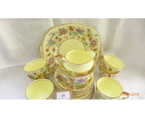 Yellow ground multi-coloured floral patterned Crown Staffordshire bone china tea service, 6 place setting (complete but no po