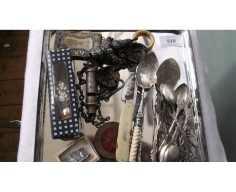 Magpie lot incl. a Warwickshire constabulary policeman's whistle, plated bottle stop, child's whistle rattle, plated spoons, 