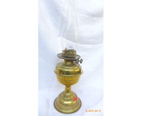Early 20th century brass oil lamp with shaped glass flue