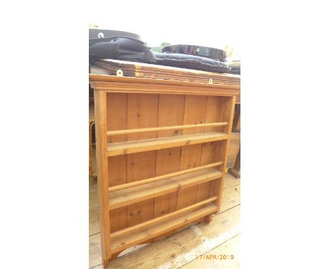 Stripped pine panel backed three drawer spice rack