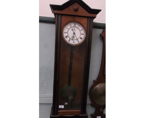 Rectangular mahogany cased Vienna wall clock with brass pendulum and single brass weight, enamel and brass dial painted Roman
