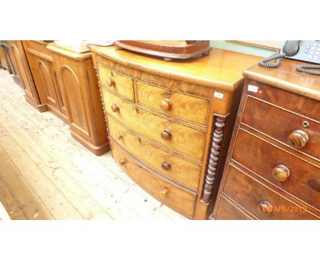 Bleached figured mahogany bow fronted 19th century chest of two short and three long drawers each with bobbin handles (43" wi