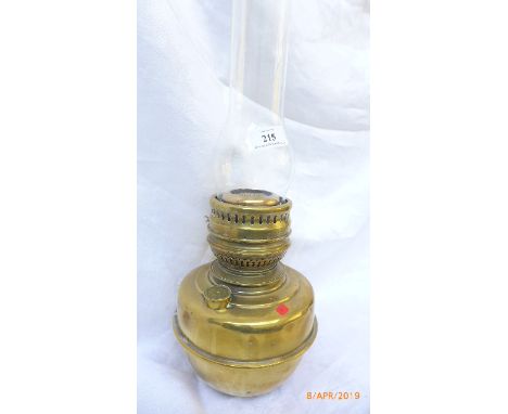 Early 20th century brass oil lamp with shaped glass flue